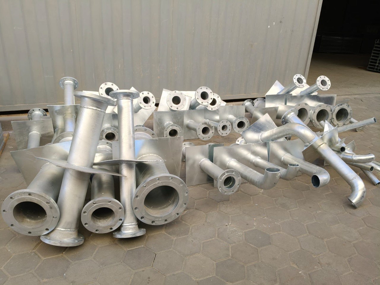 Fabricated galvanized steel pipe assemblies with flanged connections